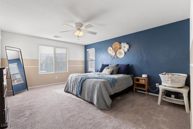 carpeted bedroom with ceiling fan