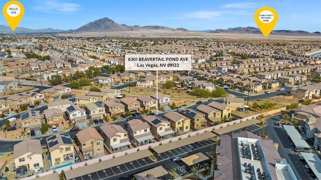 drone / aerial view featuring a mountain view