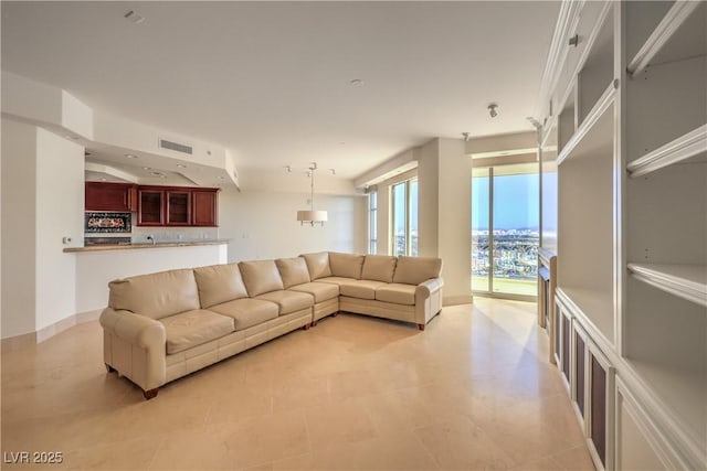 living room with light tile patterned flooring