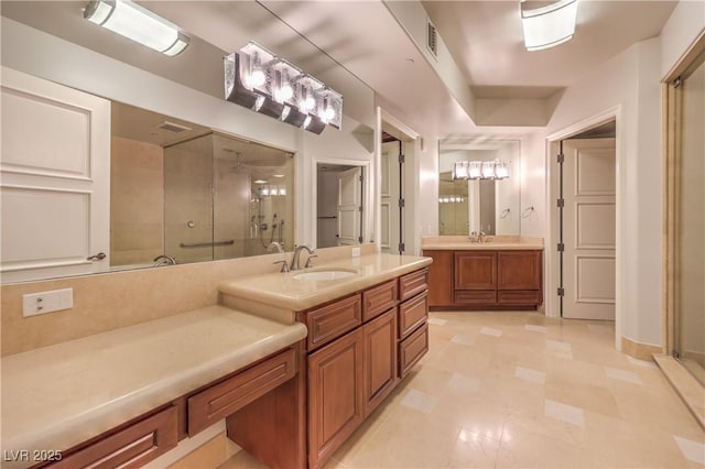 bathroom with vanity and walk in shower