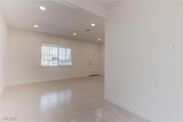 view of tiled spare room