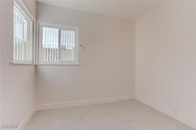 view of tiled spare room