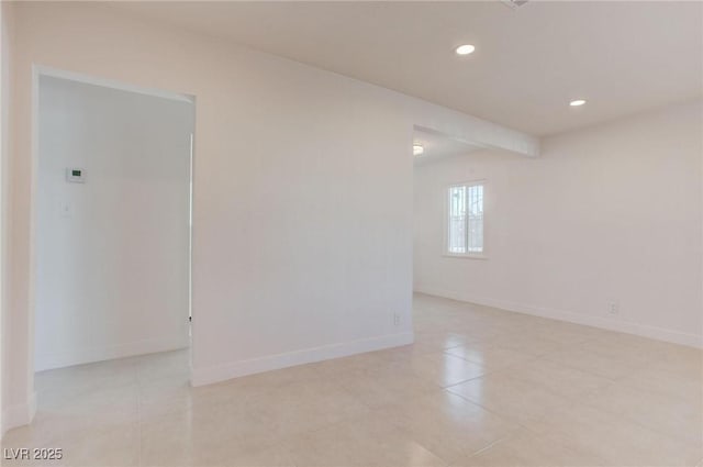 view of tiled spare room