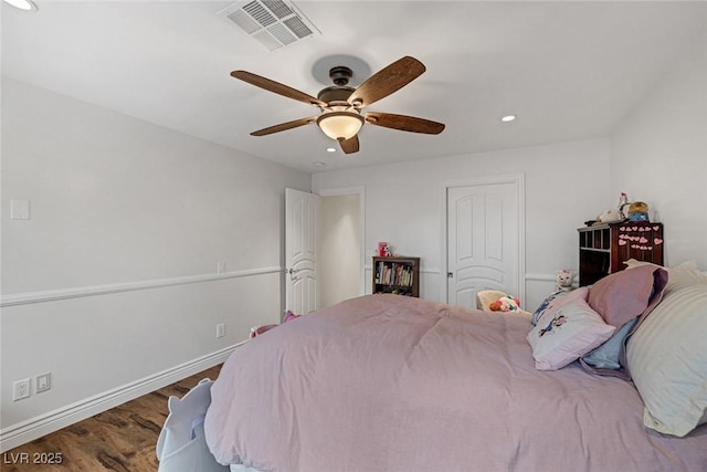 bedroom featuring ceiling fan and hardwood / wood-style floors