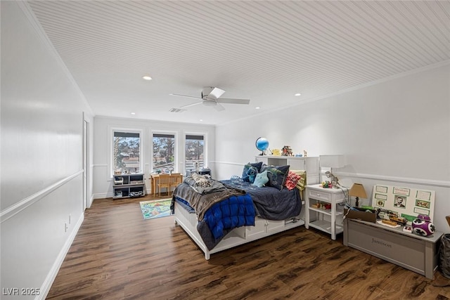 bedroom with ceiling fan, dark hardwood / wood-style flooring, and crown molding