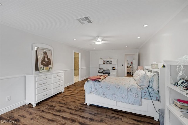 bedroom featuring ceiling fan, dark wood-type flooring, and ornamental molding