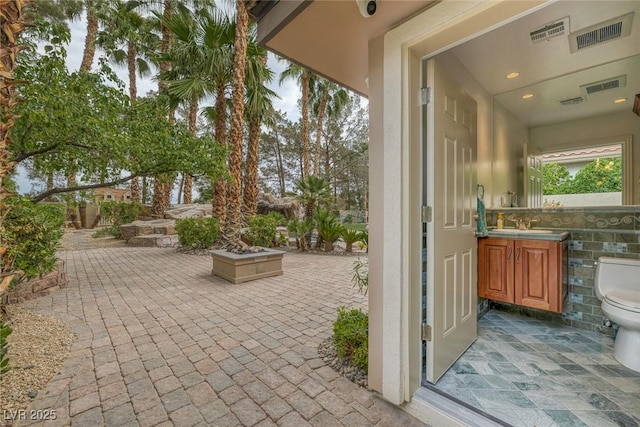 view of patio / terrace with sink