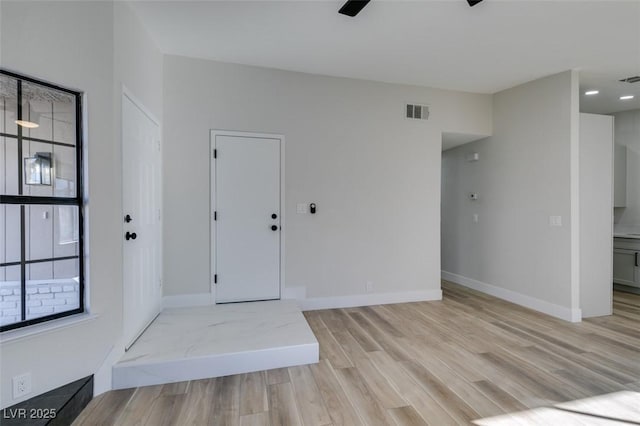 interior space with light hardwood / wood-style floors