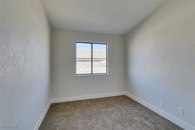 unfurnished room with carpet floors