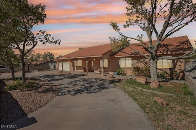 view of front of home with a garage