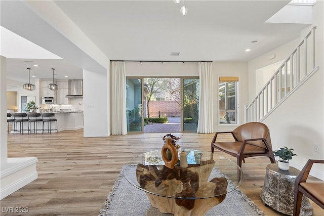 living area with light wood-type flooring