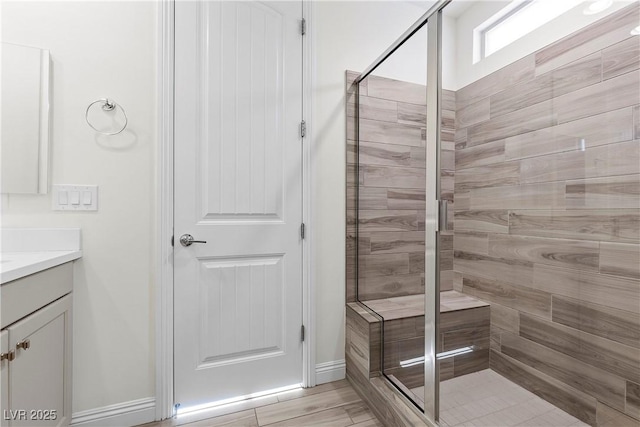 bathroom with vanity and an enclosed shower