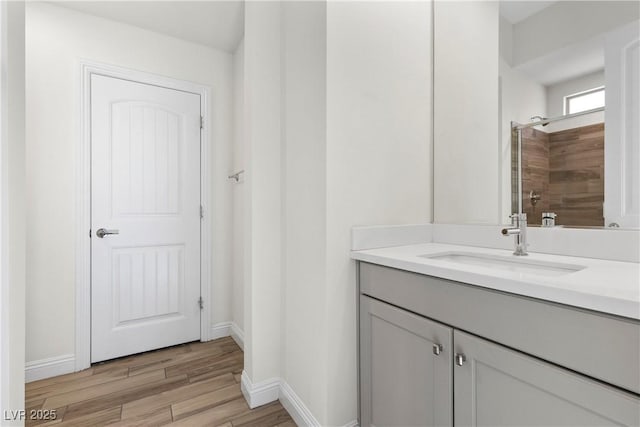 bathroom featuring vanity and walk in shower