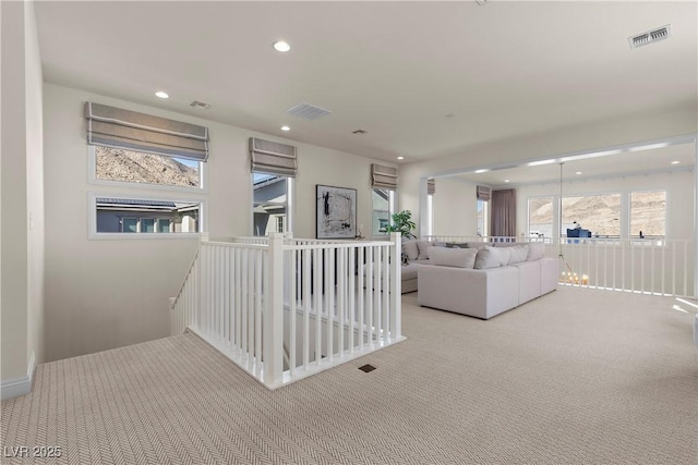 living room with light colored carpet