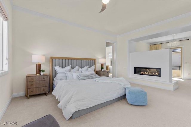 bedroom with multiple windows, ceiling fan, light colored carpet, and ornamental molding