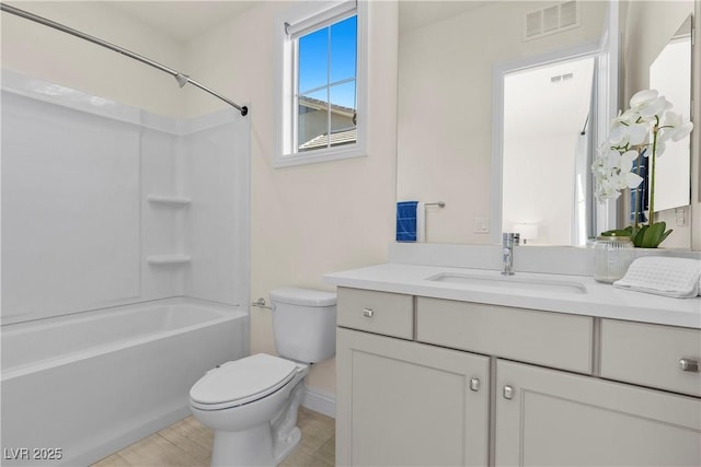 full bathroom with shower / bathing tub combination, vanity, and toilet