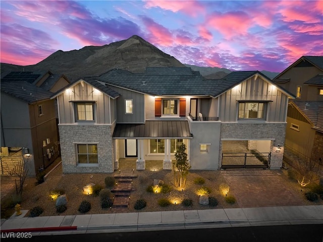 view of front of property with a mountain view