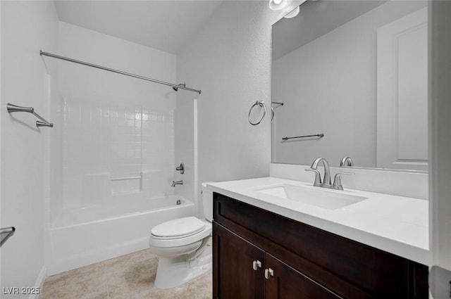 bathroom with toilet, vanity, and  shower combination