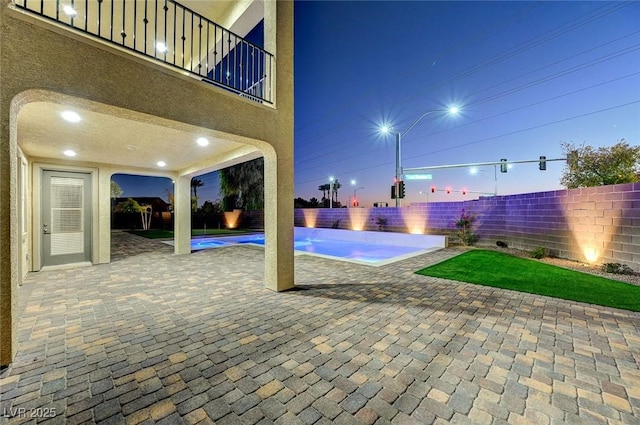 view of pool with a fenced in pool, a patio, and a fenced backyard