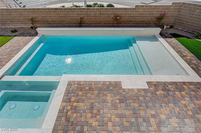 view of pool featuring a fenced backyard