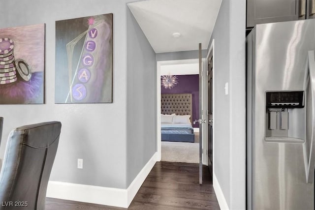 hallway featuring dark hardwood / wood-style floors