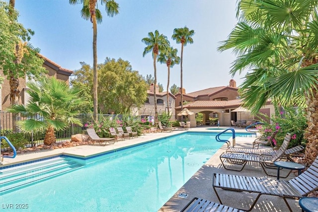 view of swimming pool featuring a patio