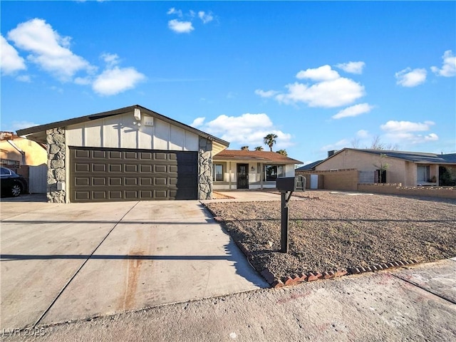 single story home featuring a garage