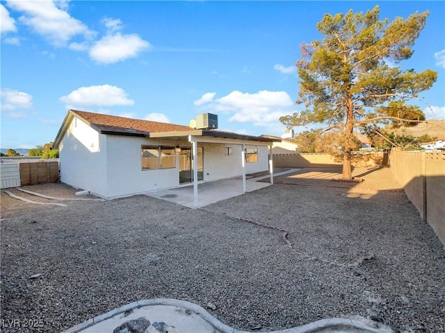 back of house featuring a patio area and central AC