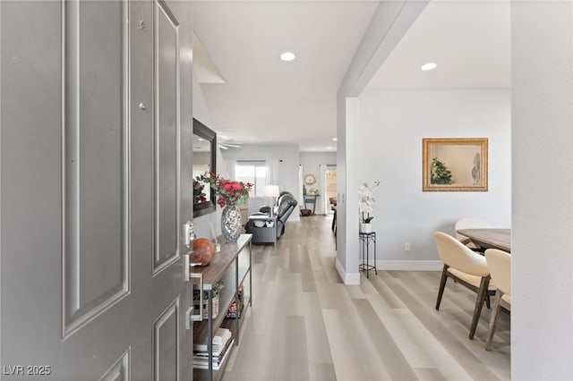 hallway with light wood-type flooring