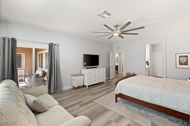 bedroom featuring light hardwood / wood-style floors and ceiling fan