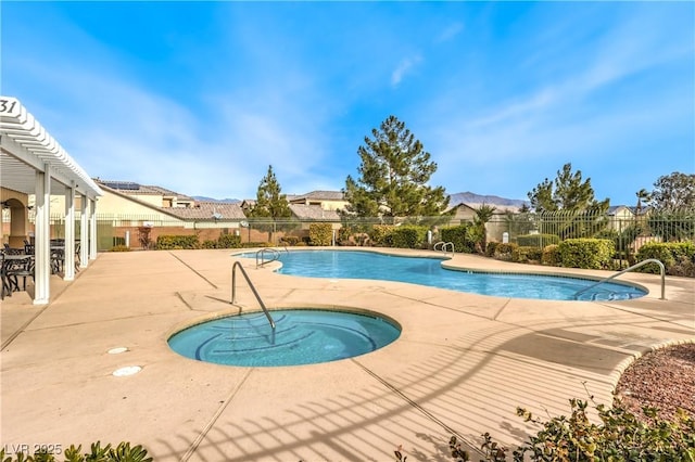 view of swimming pool featuring a pergola, a community hot tub, and a patio