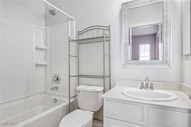 full bathroom with vanity, bathtub / shower combination, and toilet