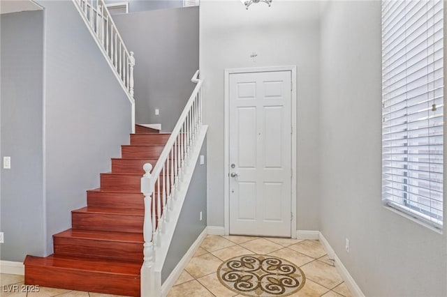 interior space with tile patterned floors