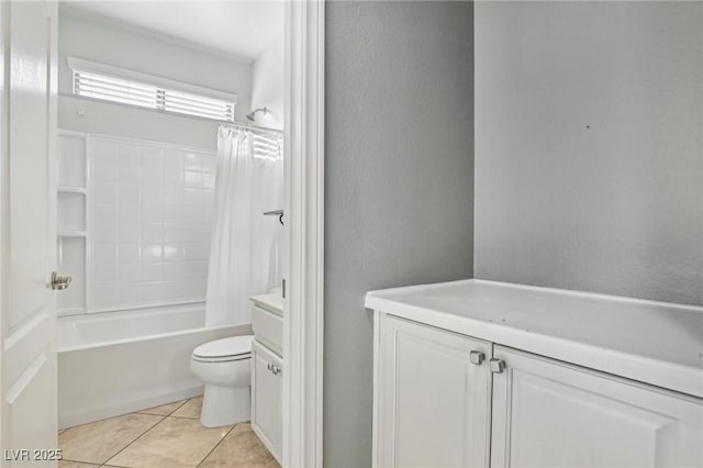 full bathroom featuring tile patterned floors, vanity, toilet, and shower / bathtub combination with curtain