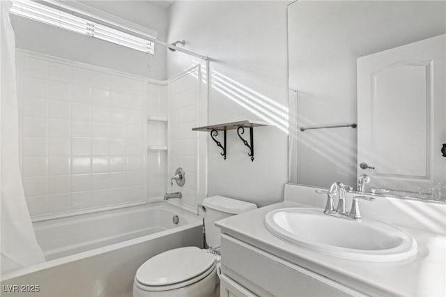 full bathroom featuring shower / bath combo with shower curtain, vanity, and toilet