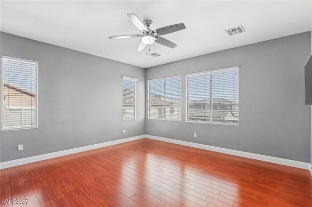 unfurnished room featuring wood-type flooring and ceiling fan