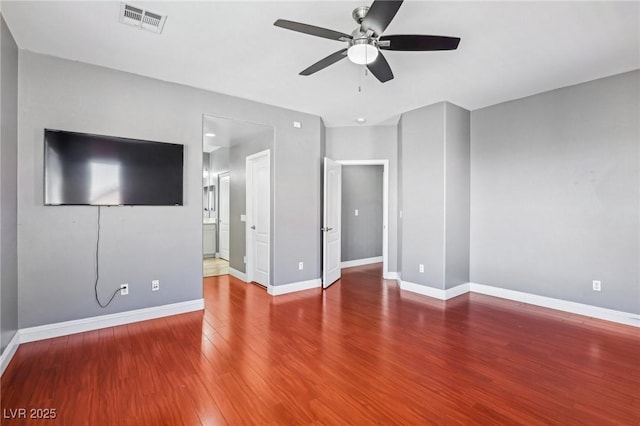 unfurnished living room featuring hardwood / wood-style floors and ceiling fan