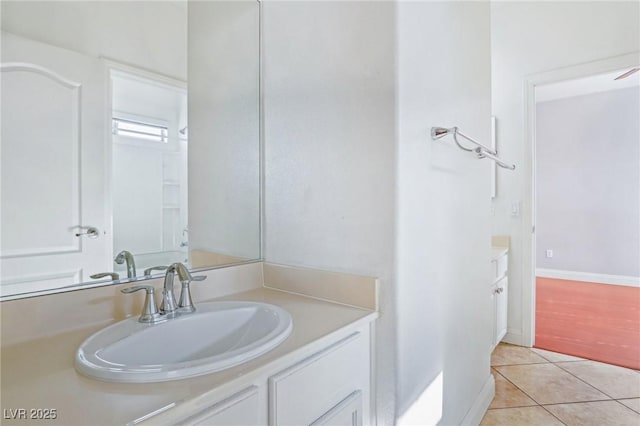 bathroom featuring tile patterned floors and vanity