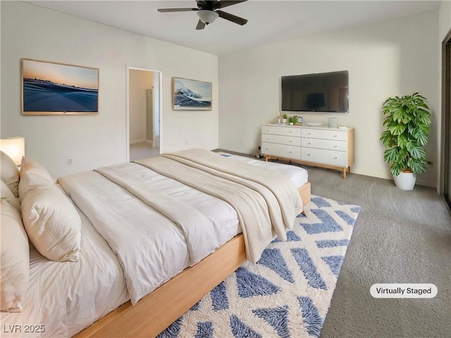 carpeted bedroom with ceiling fan