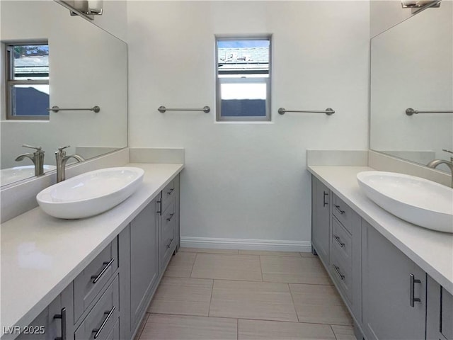 bathroom with vanity and tile patterned floors