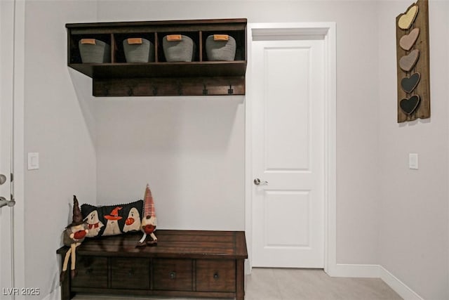 mudroom featuring light tile patterned flooring