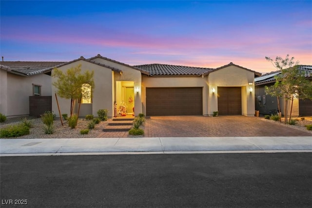 view of front of home featuring a garage