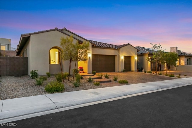 view of front of house with a garage