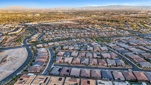 drone / aerial view featuring a mountain view