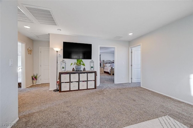 living room with recessed lighting, carpet, visible vents, and baseboards