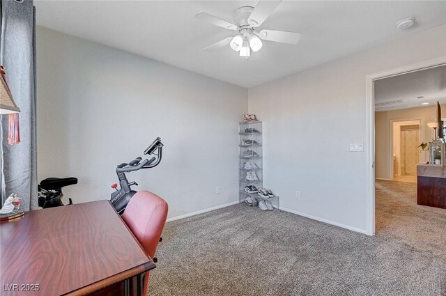 office space with ceiling fan, carpet flooring, and baseboards