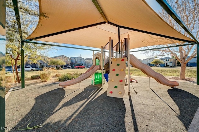 community play area with a residential view