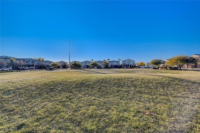 view of yard with a residential view