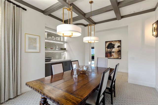 carpeted dining room with beam ceiling and coffered ceiling