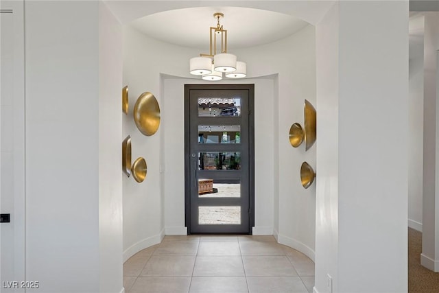 foyer entrance featuring light tile patterned floors